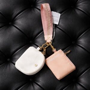 Lululemon Athletica orange and cream Key & Card Holder Set